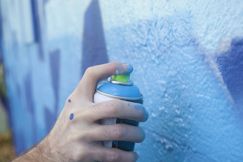 What are side effects of inhaling toxic spray paint fumes?